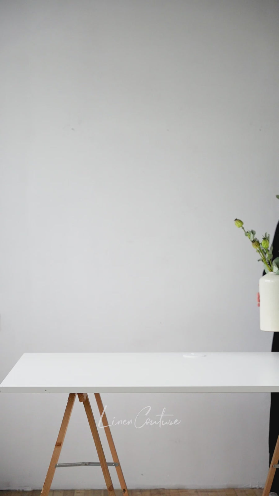 White linen tablecloth with ruffles